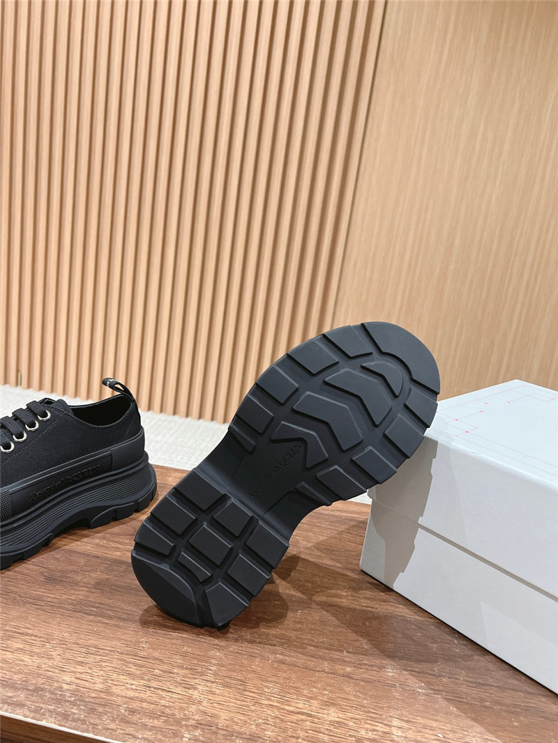 a1exa*der Mcqv*en black tread slick low top sneakers