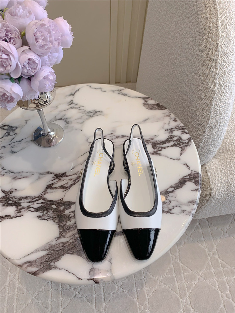 Ch**el pumps & slingbacks in white/black goatskin