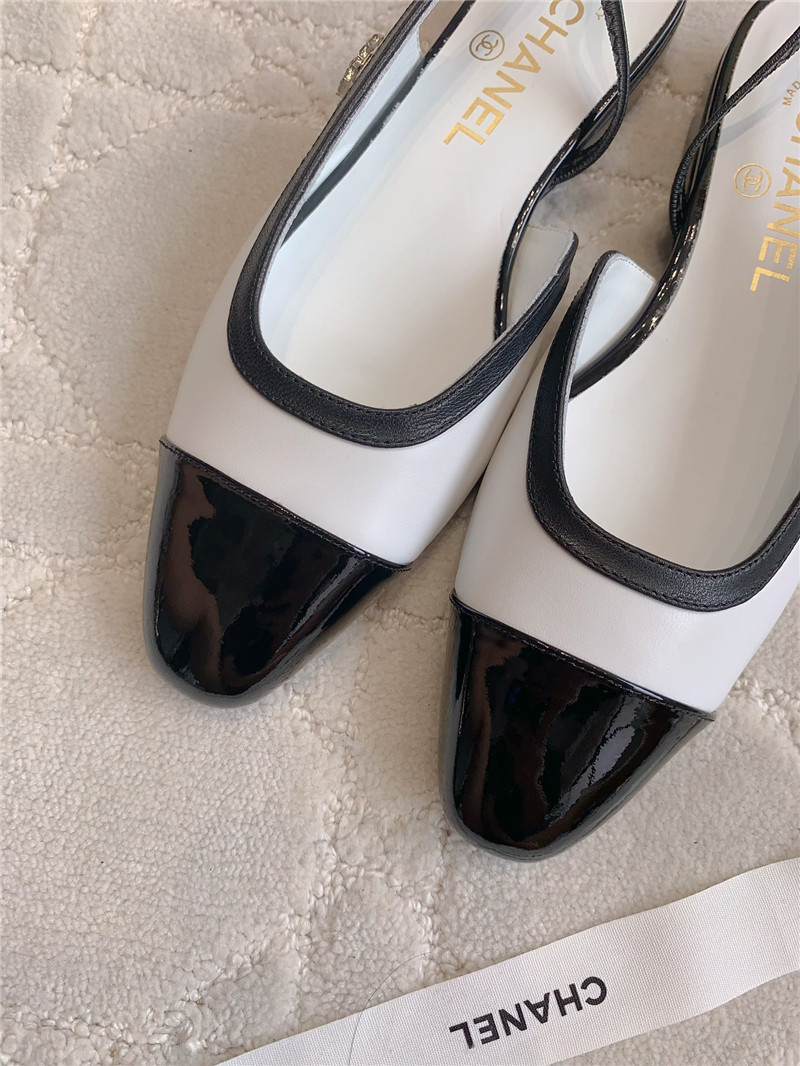 Ch**el pumps & slingbacks in white/black goatskin