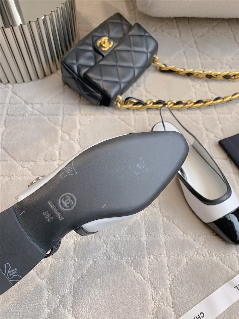 Ch**el pumps & slingbacks in white/black goatskin