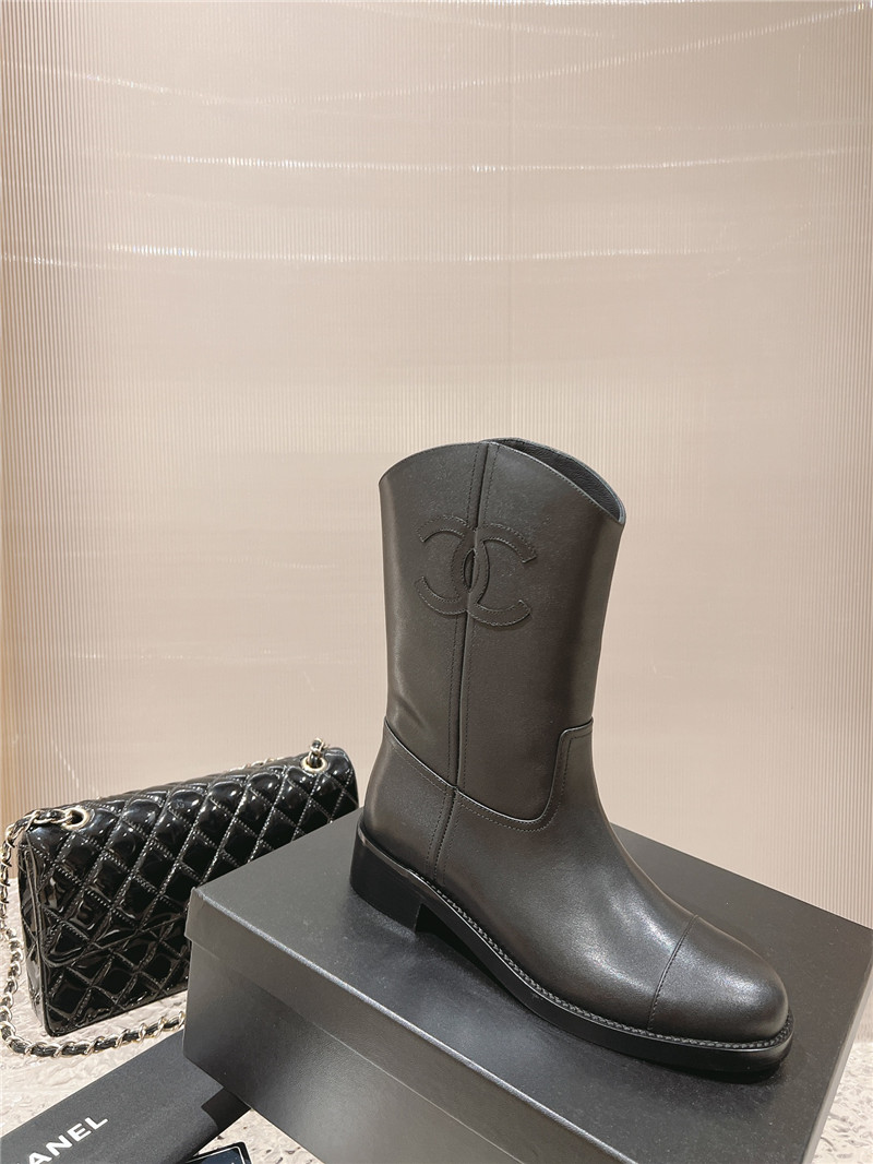 Ch**el black calfskin rider ankle boots