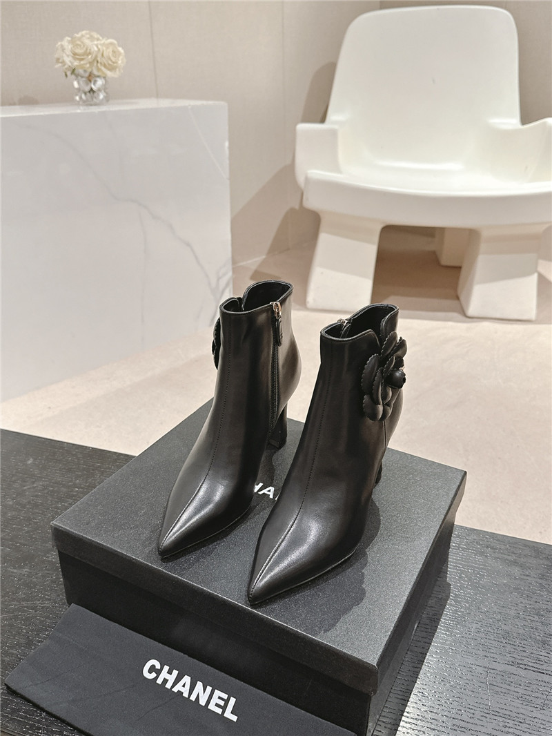 Ch**el heel black calfskin pointed toe boots