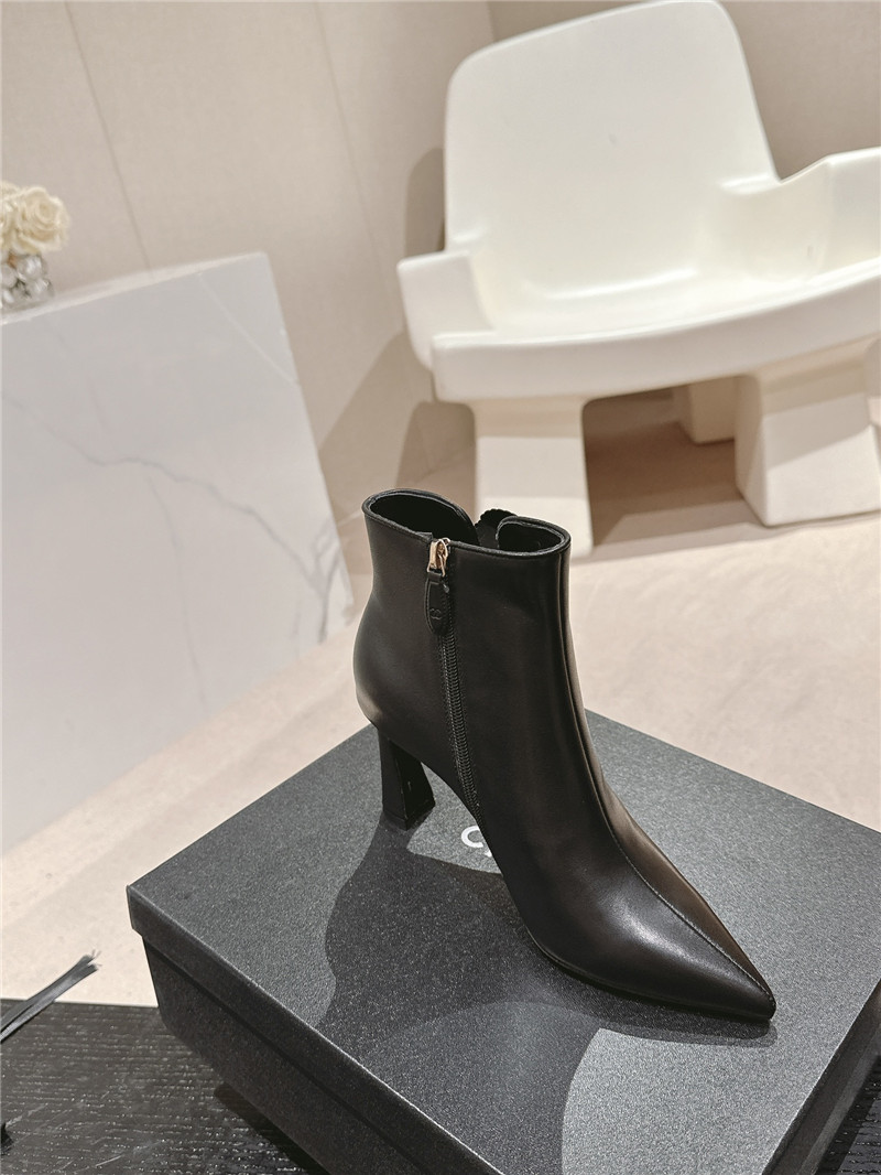 Ch**el heel black calfskin pointed toe boots