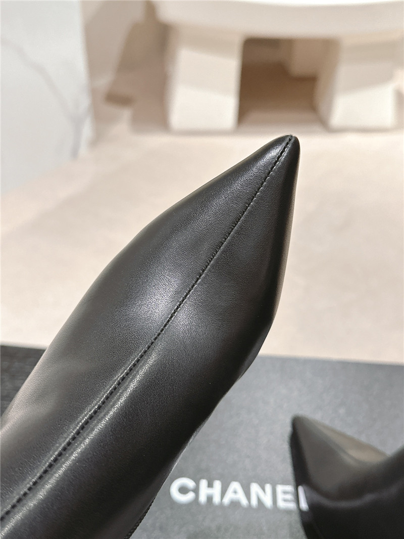 Ch**el heel black calfskin pointed toe boots