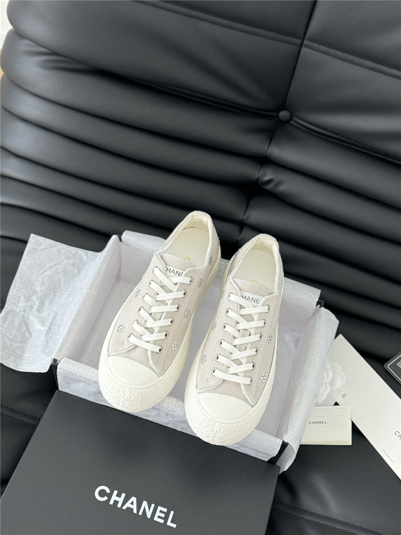 Ch**el beige lace-up low top canvas sneakers