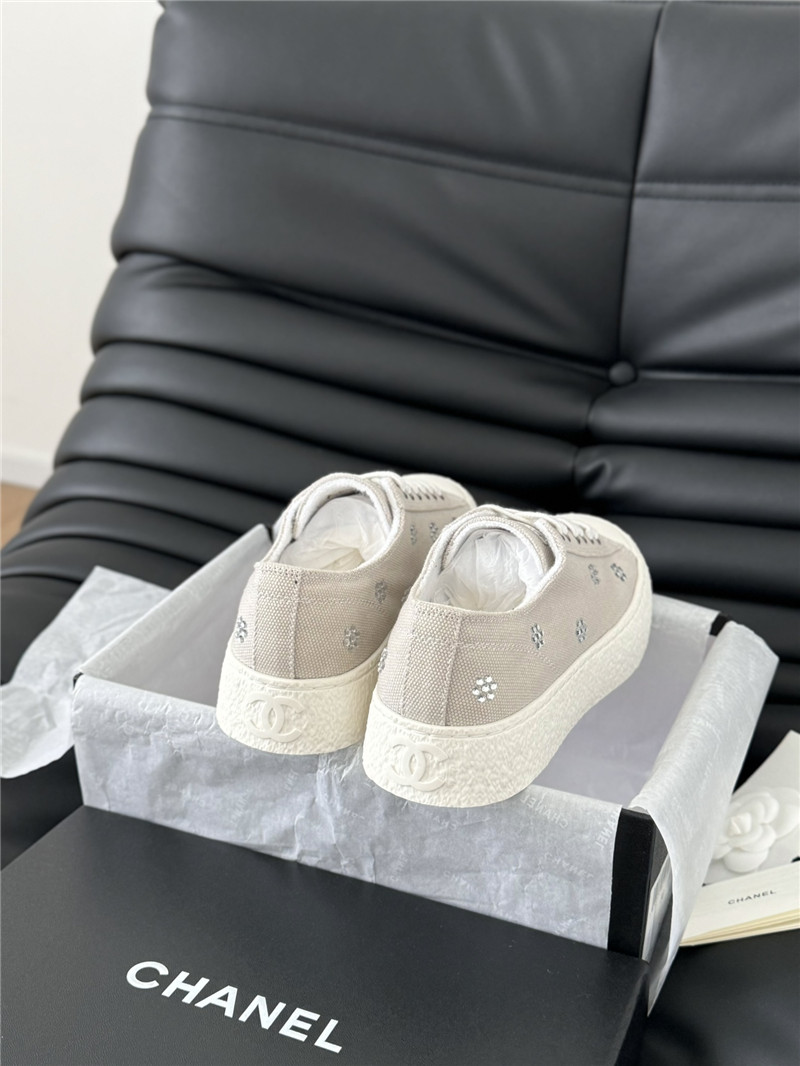 Ch**el beige lace-up low top canvas sneakers