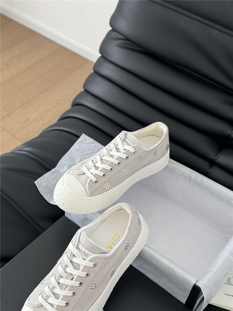 Ch**el beige lace-up low top canvas sneakers