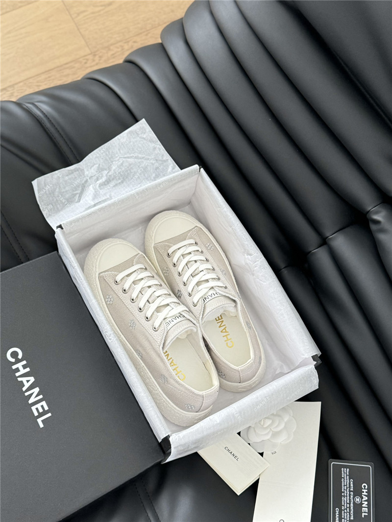 Ch**el beige lace-up low top canvas sneakers