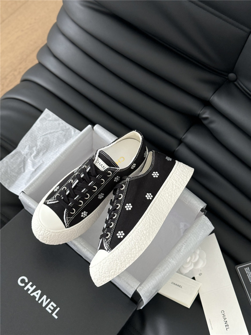 Ch**el black lace-up low top canvas sneakers