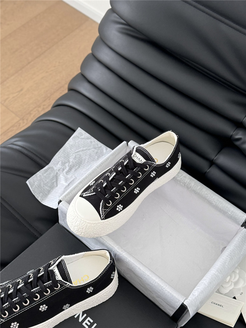 Ch**el black lace-up low top canvas sneakers