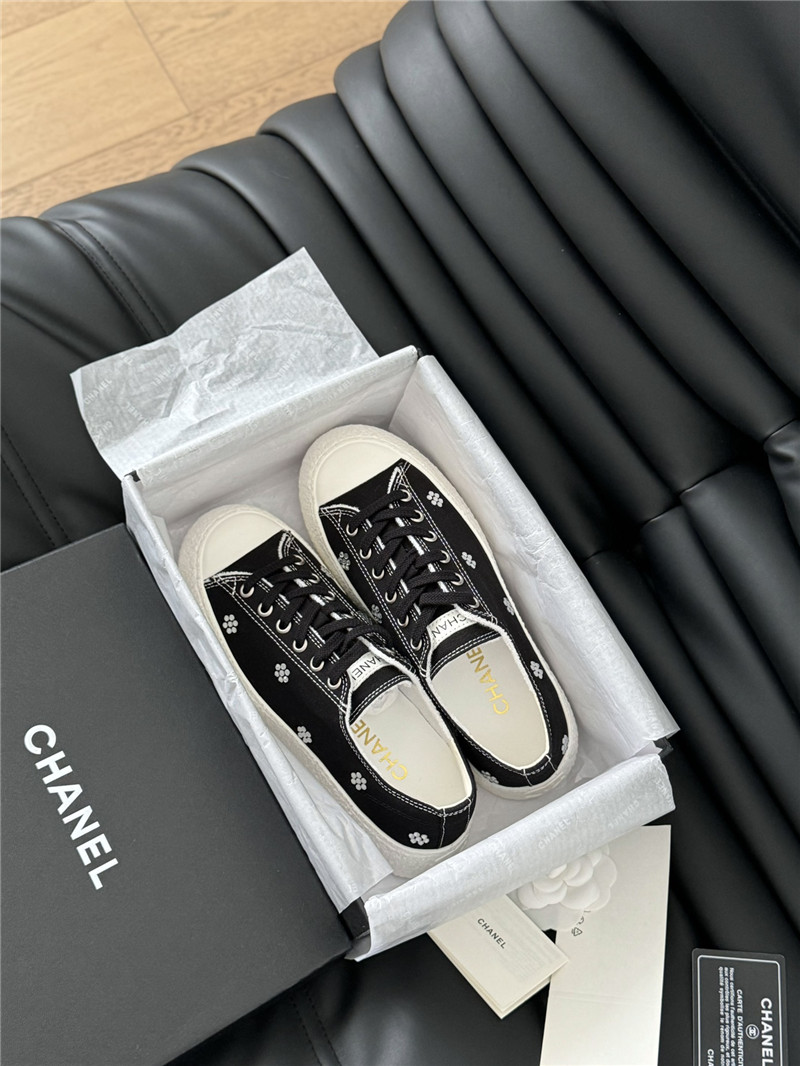 Ch**el black lace-up low top canvas sneakers