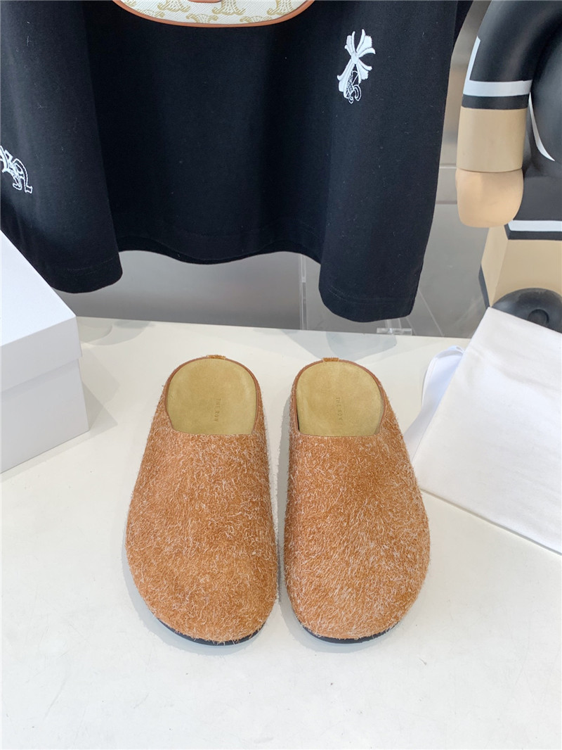 The R0w hugo slide in orange brush suede