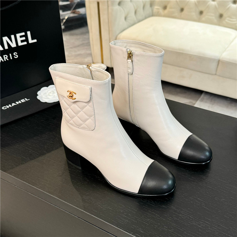Ch**el calfskin cap toe ankle boots in white