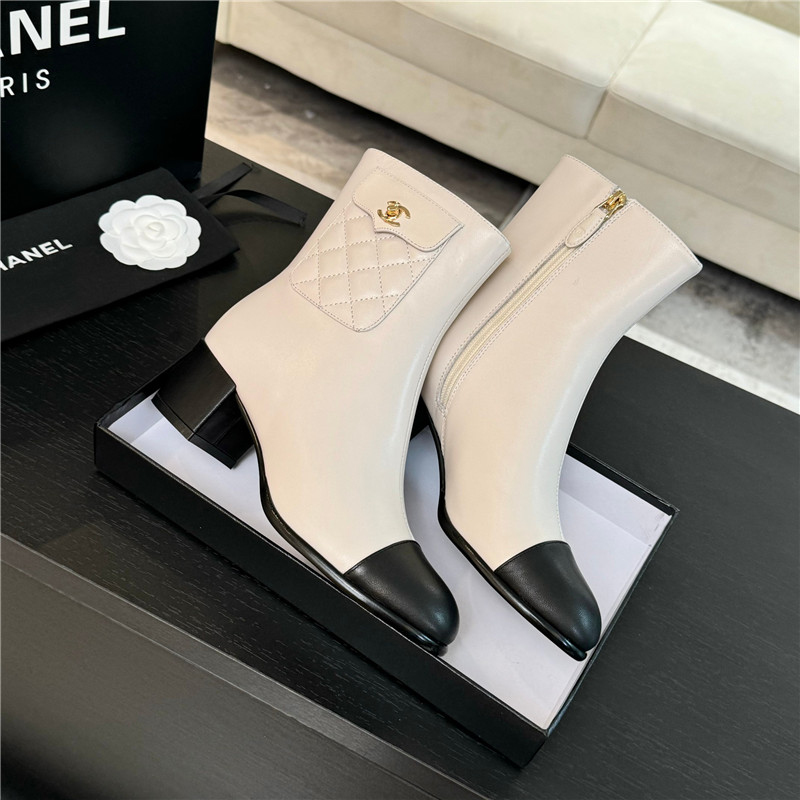 Ch**el calfskin cap toe ankle boots in white