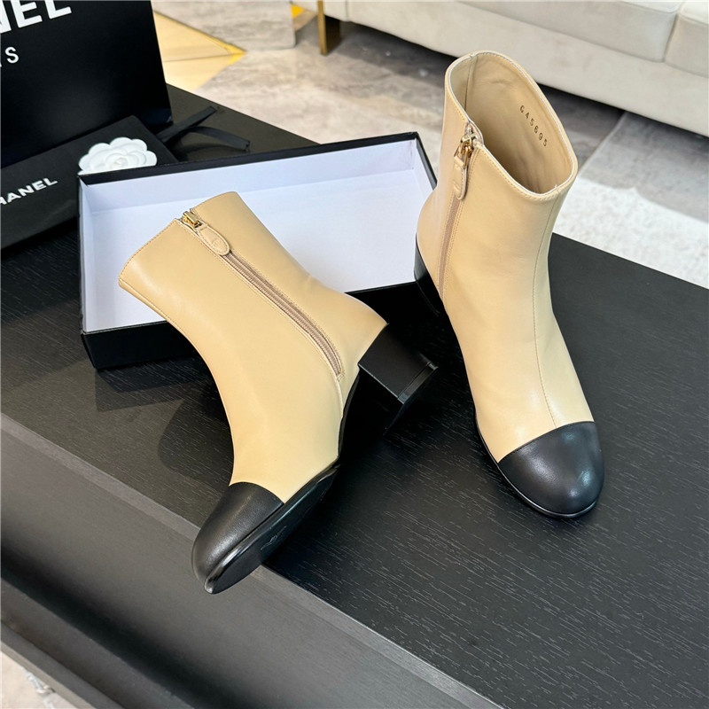 Ch**el brown calfskin cap toe ankle boots