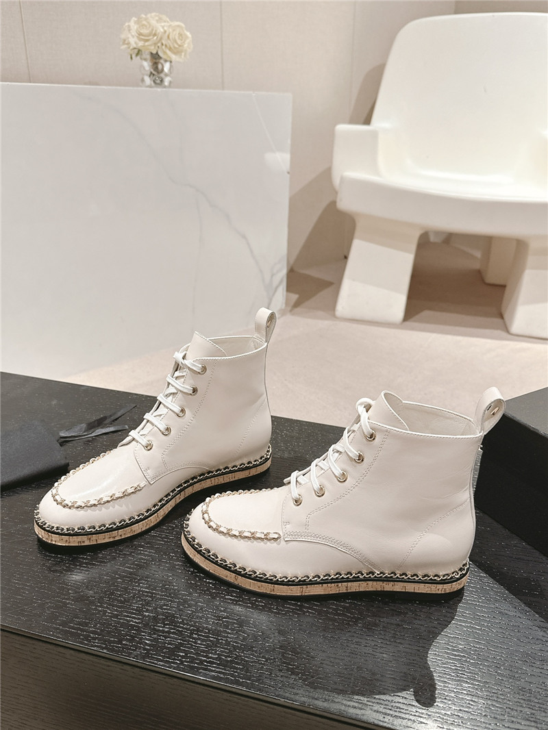 Ch**el lace-up calfskin flat ankle boots in beige