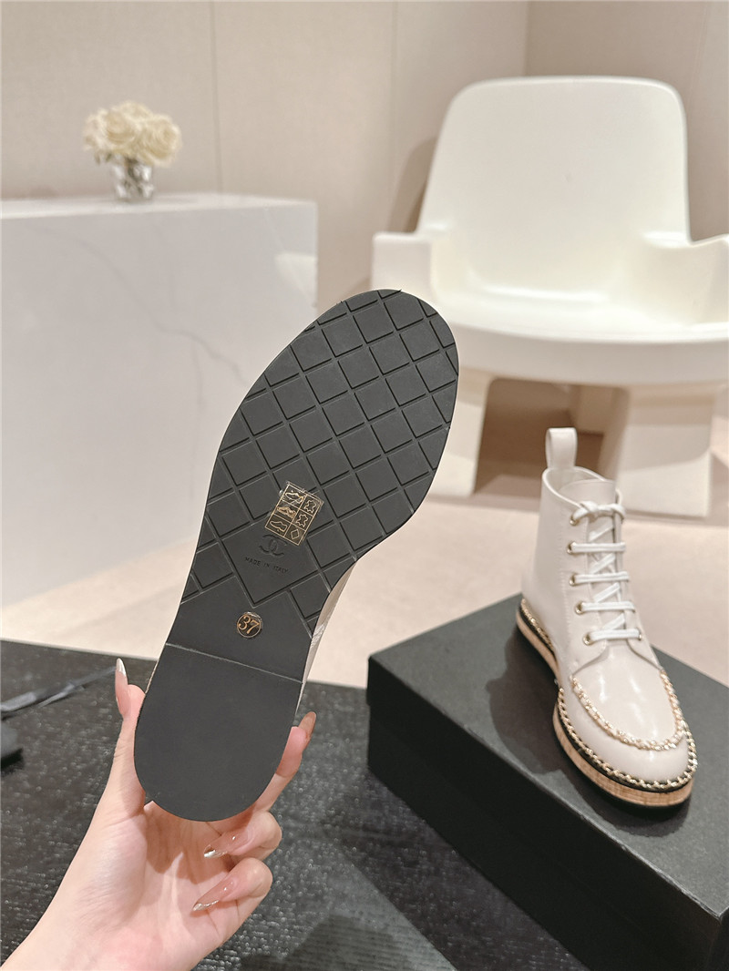 Ch**el lace-up calfskin flat ankle boots in white