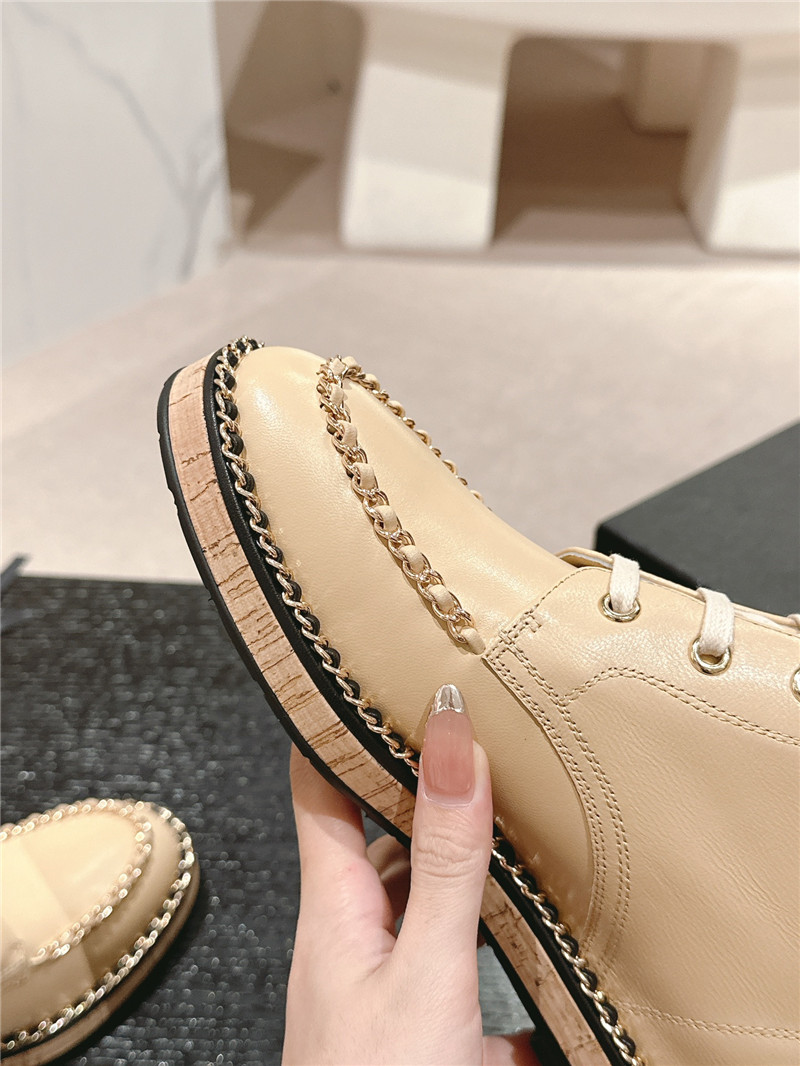 Ch**el lace-up calfskin flat ankle boots in beige