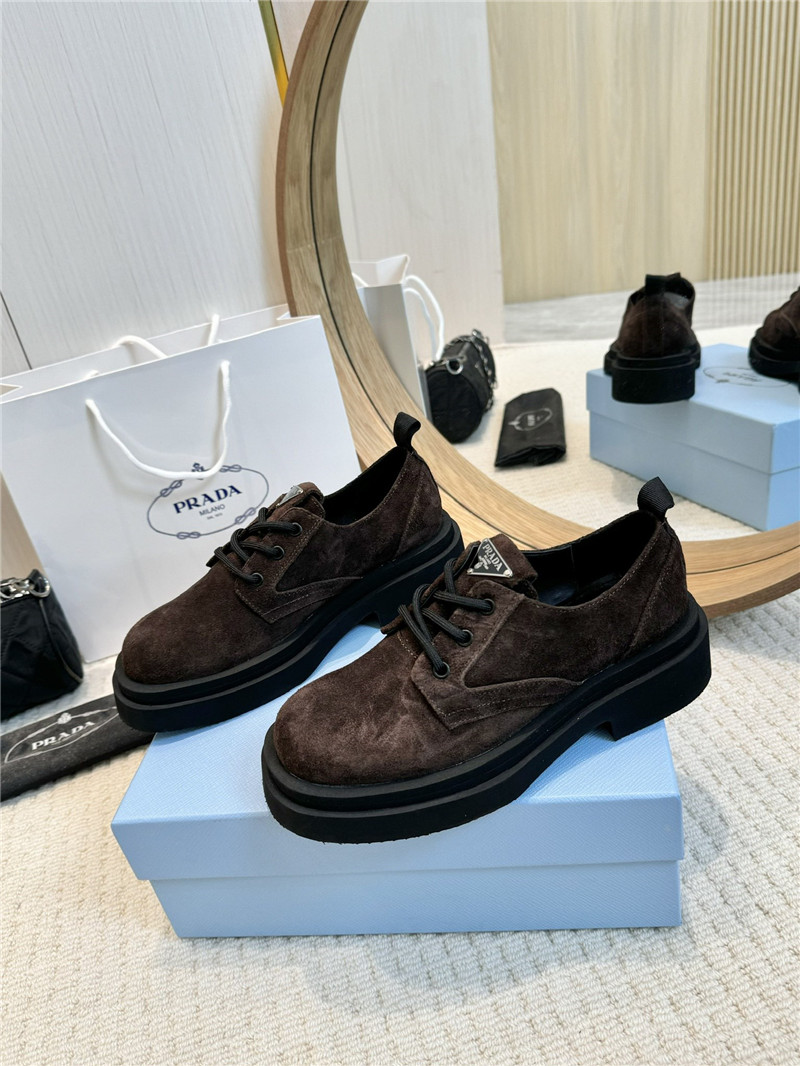 Pra*a brown suede leather triangle logo loafers