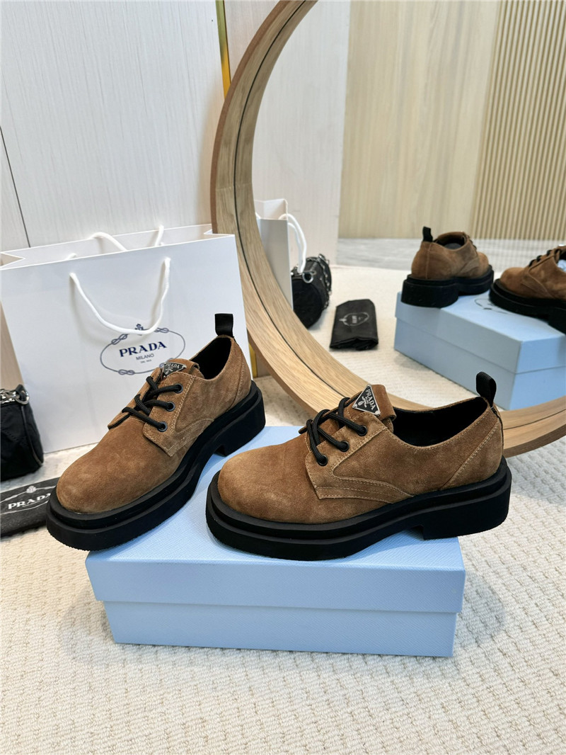 Pra*a suede leather triangle logo loafers