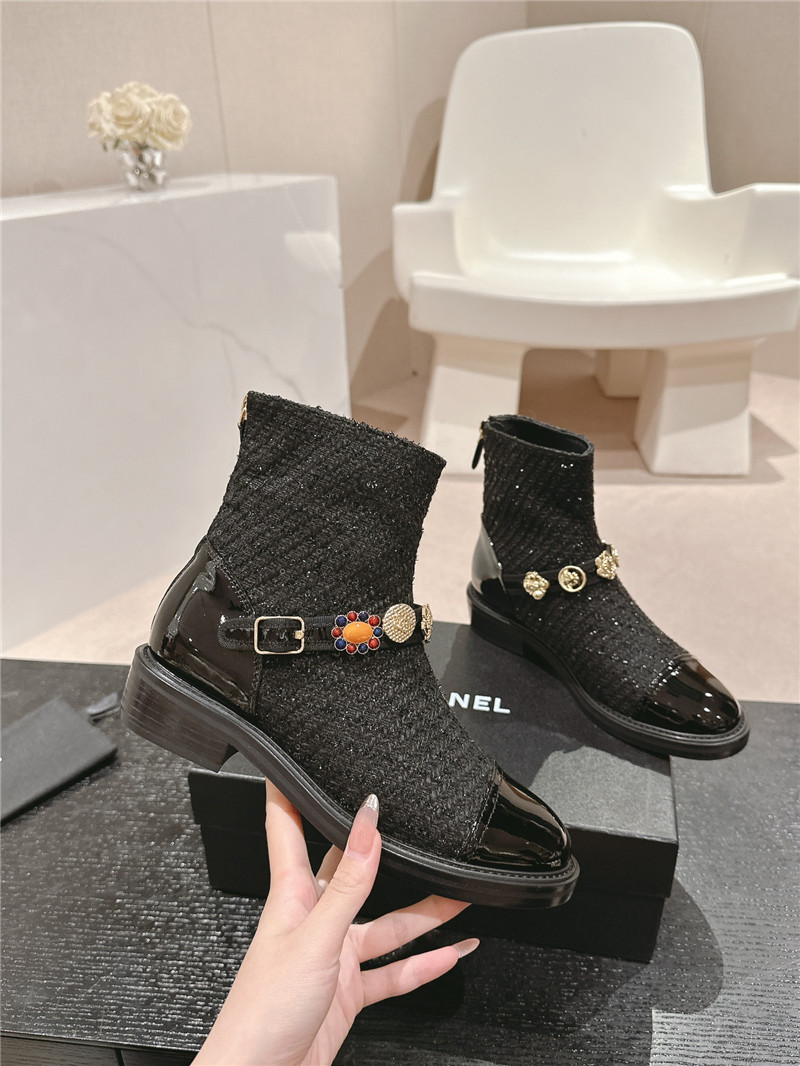 Ch**el enamel buckle chelsea boots in black