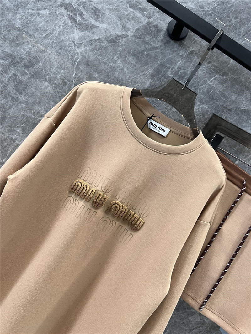 M1um1u sweatshirt + short skirt set