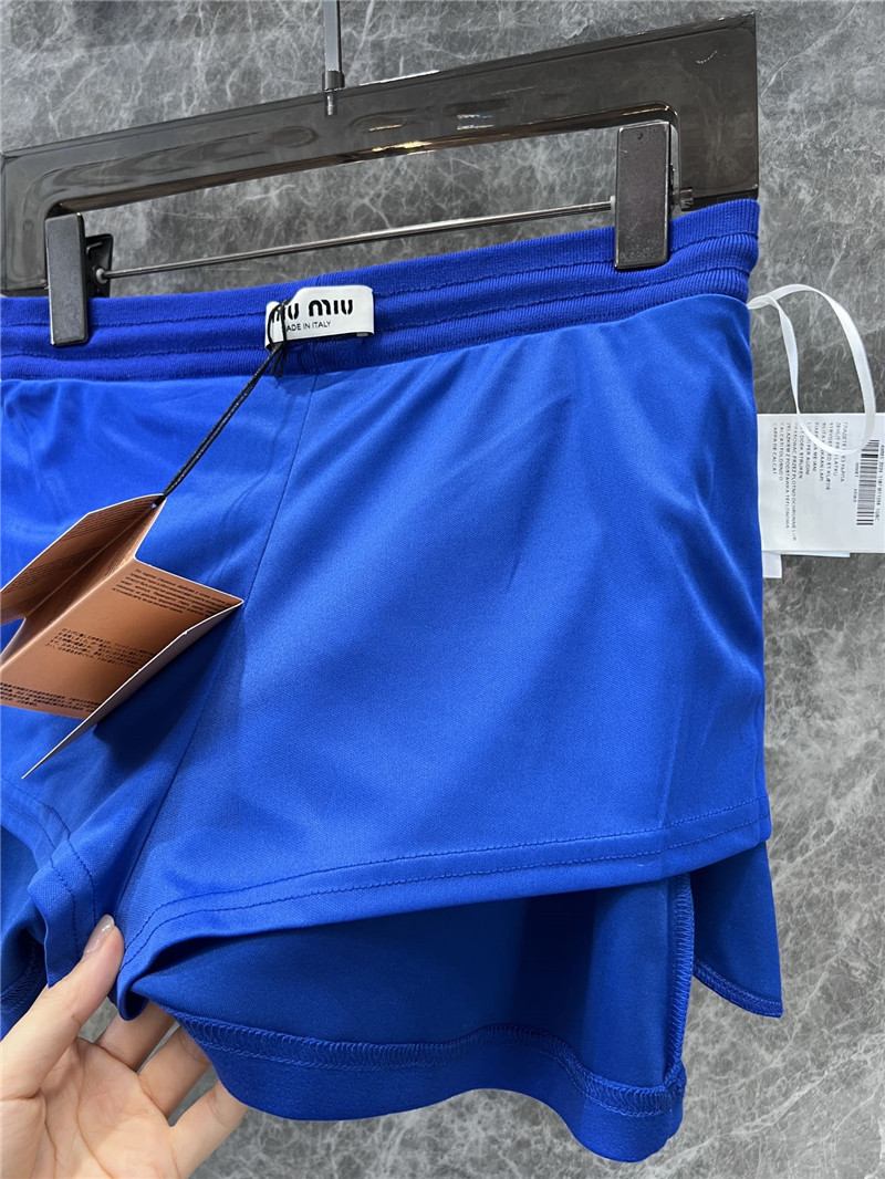 M1um1u sweatshirt + short skirt set