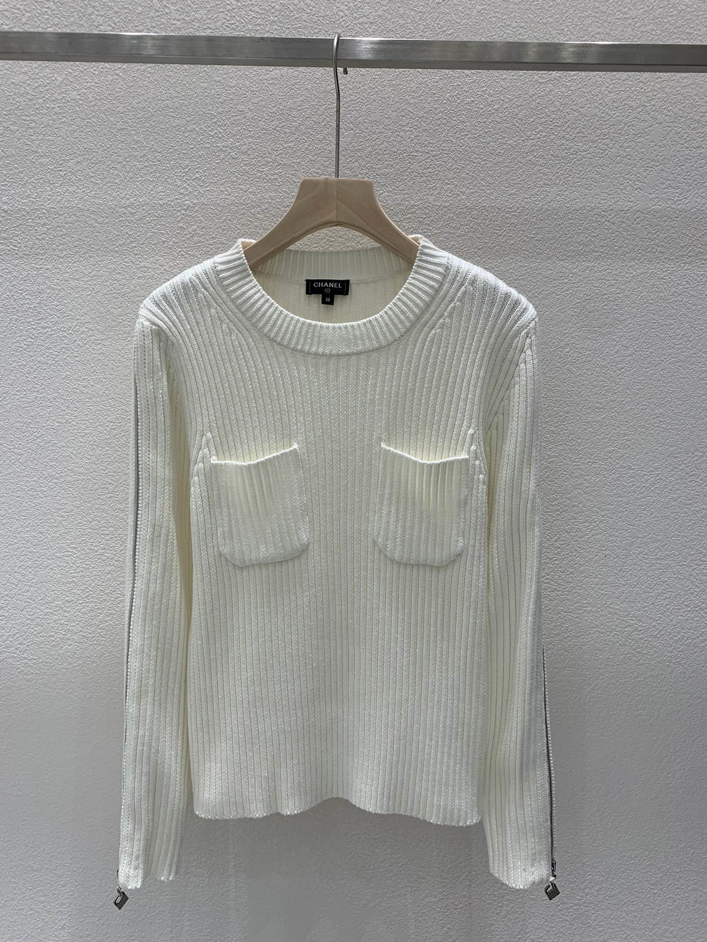 Ch**el zipper trim rib-knit sweater in white