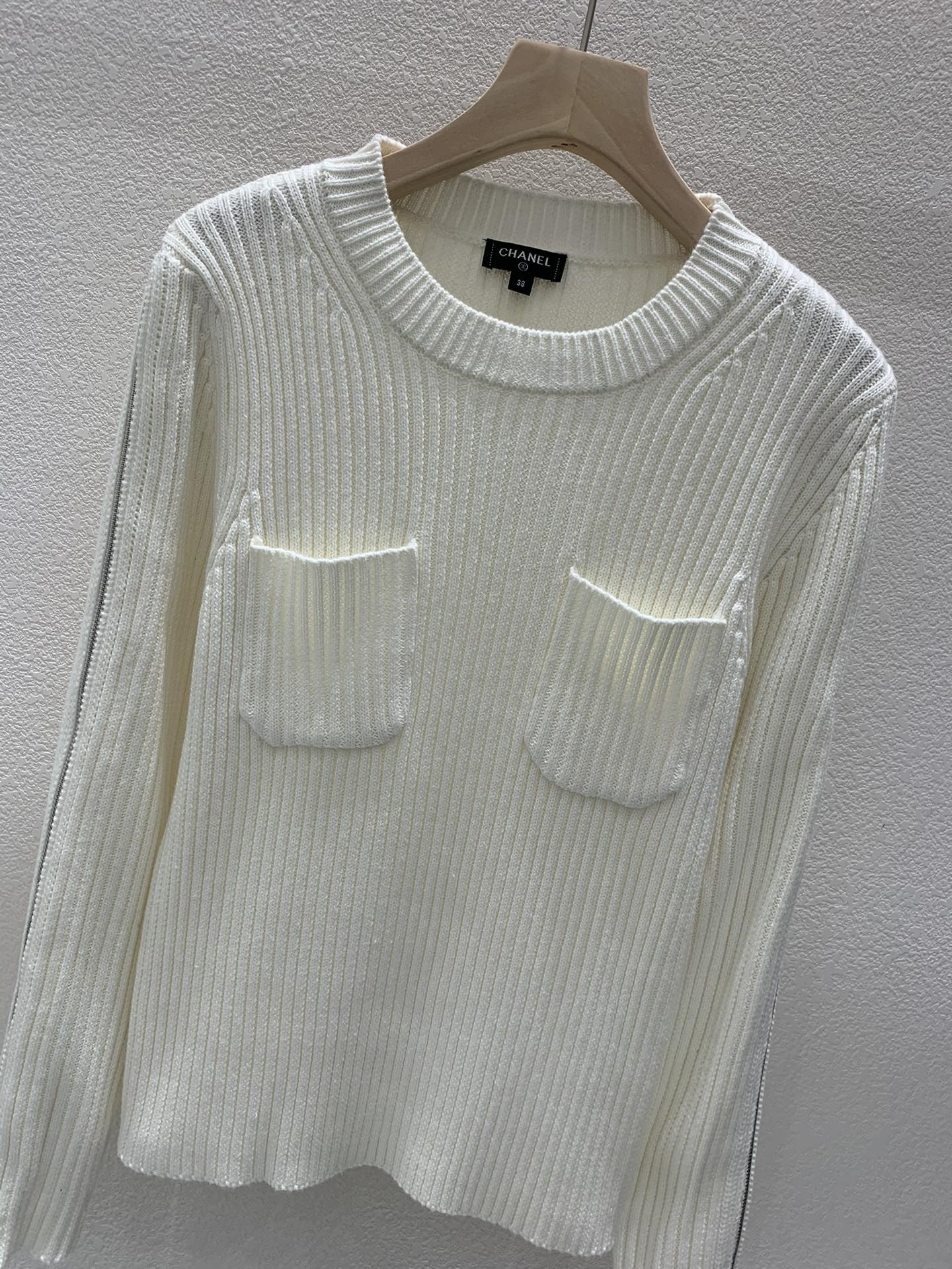Ch**el zipper trim rib-knit sweater in white