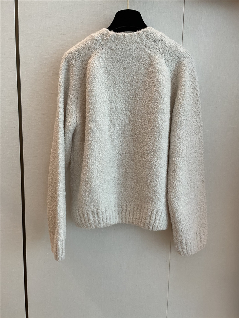 Ch**el cream printed logo wool sweater
