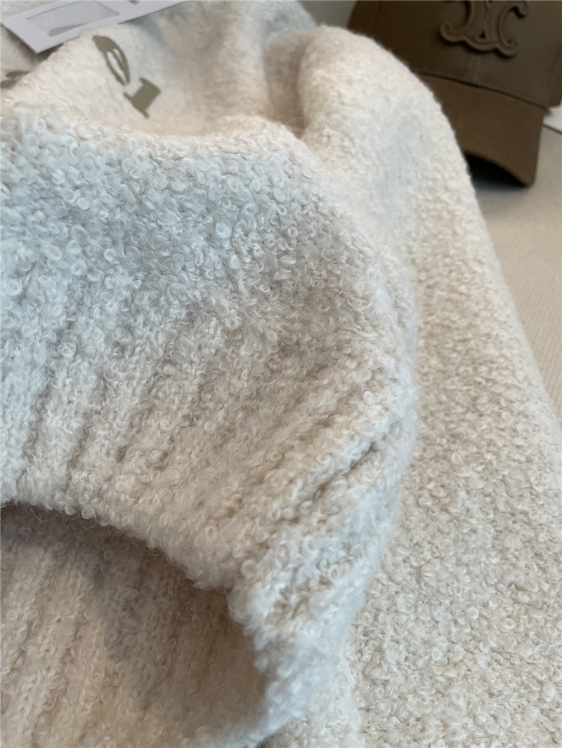 Ch**el cream printed logo wool sweater