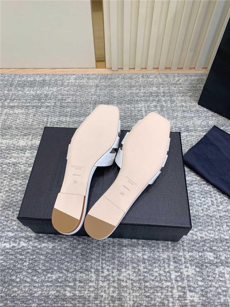 Y51 tribute mules in white ostrich leather