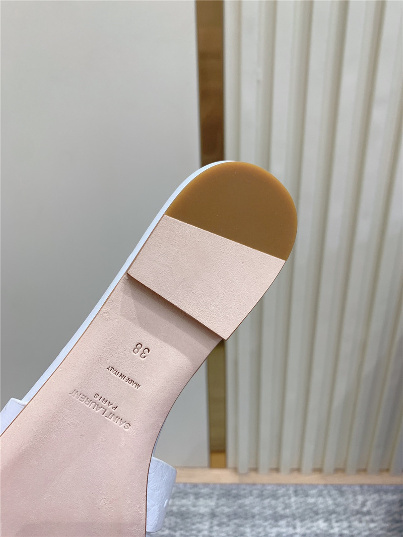 Y51 tribute mules in white ostrich leather