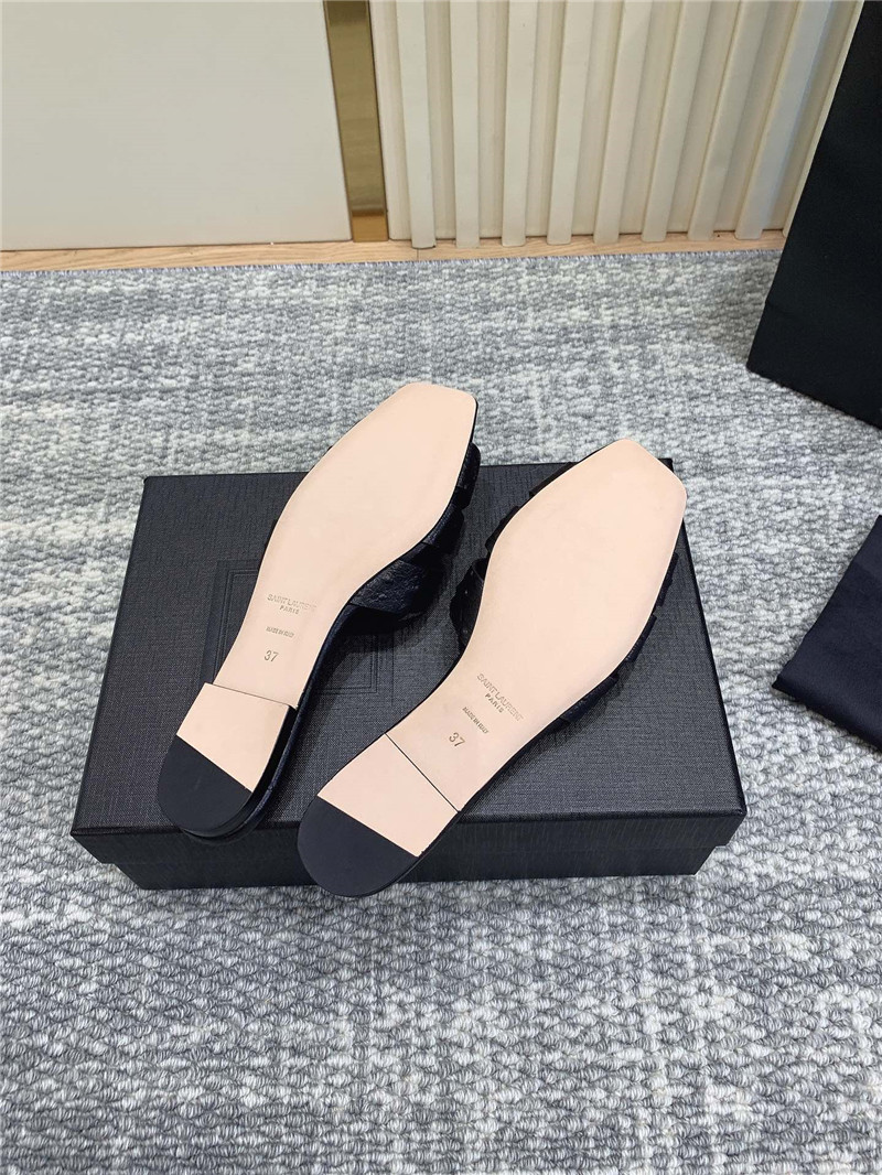 Y51 tribute mules in black ostrich leather