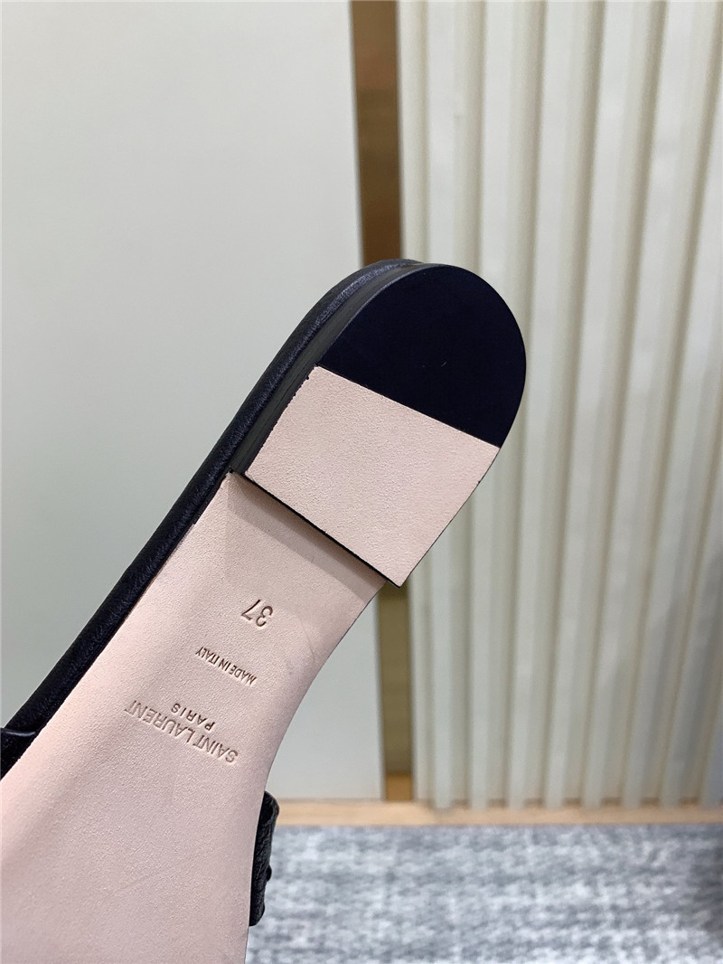 Y51 tribute mules in black ostrich leather