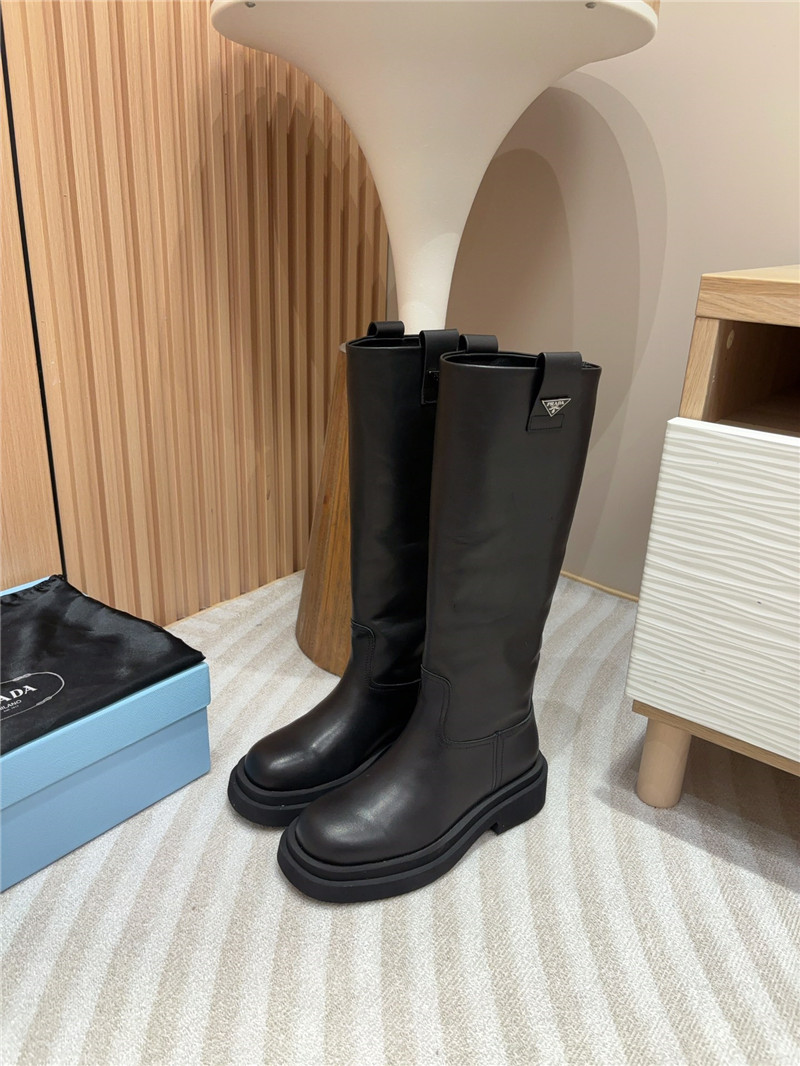 Pra*a women logo plaque leather boots in black