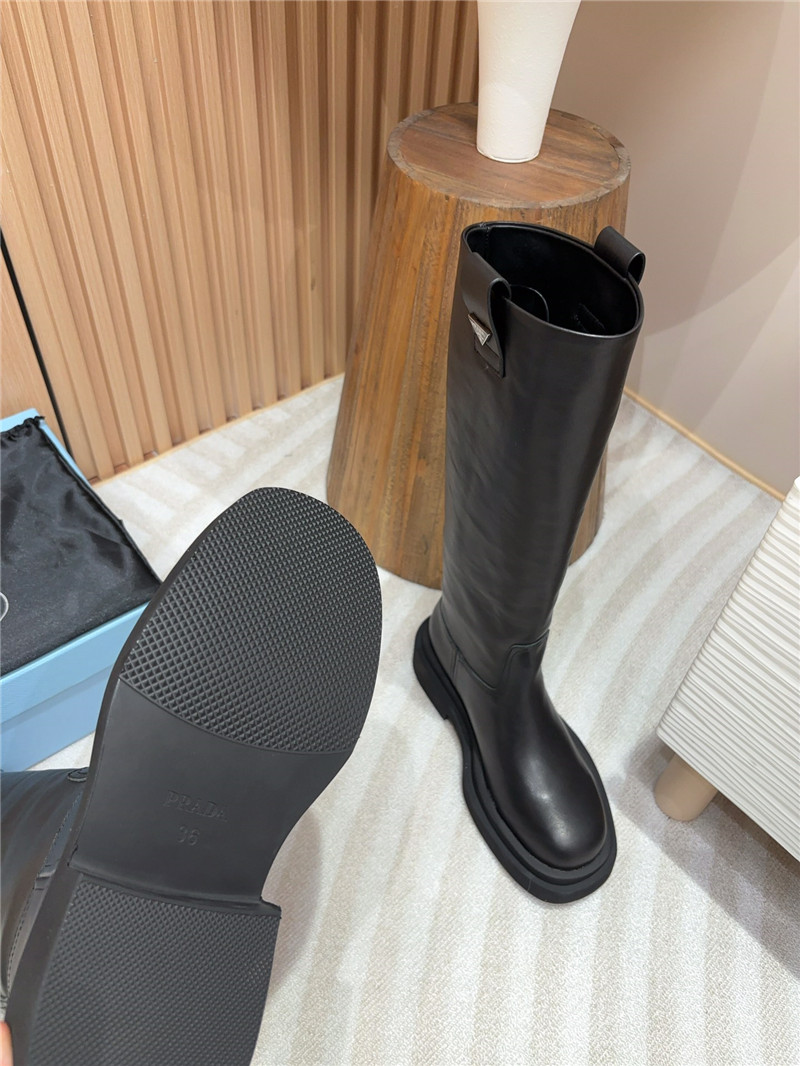 Pra*a women logo plaque leather boots in black