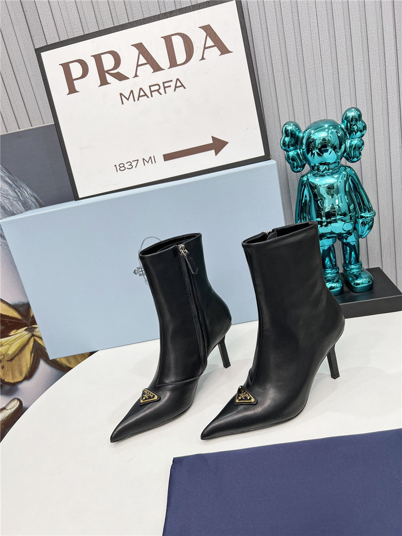 Pra*a black calfskin heeled ankle boots