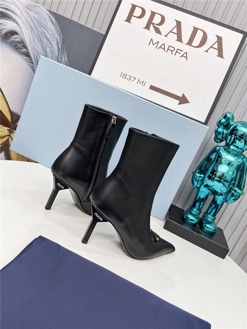 Pra*a black calfskin heeled ankle boots