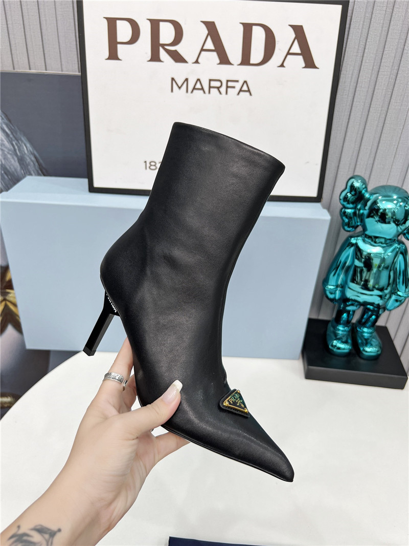 Pra*a black calfskin heeled ankle boots