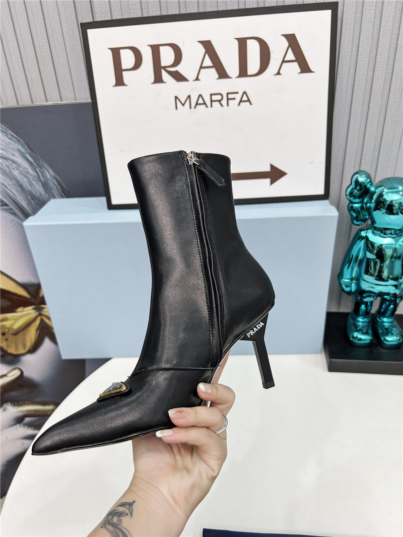 Pra*a black calfskin heeled ankle boots
