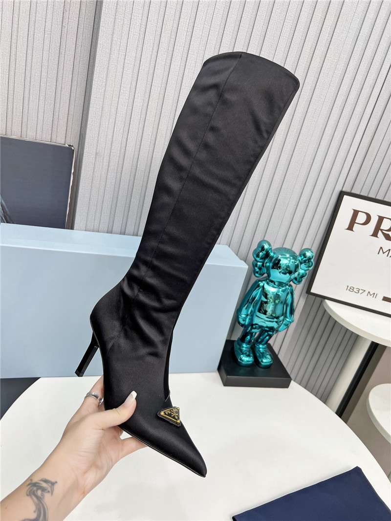 Pra*a black heel knee high boots