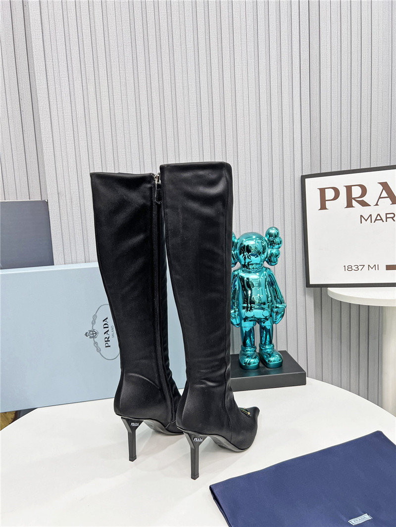 Pra*a black heel knee high boots