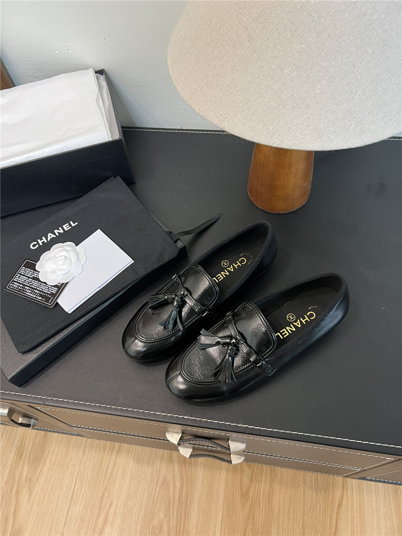 Ch**el tassel moccasin loafers in black smooth leather