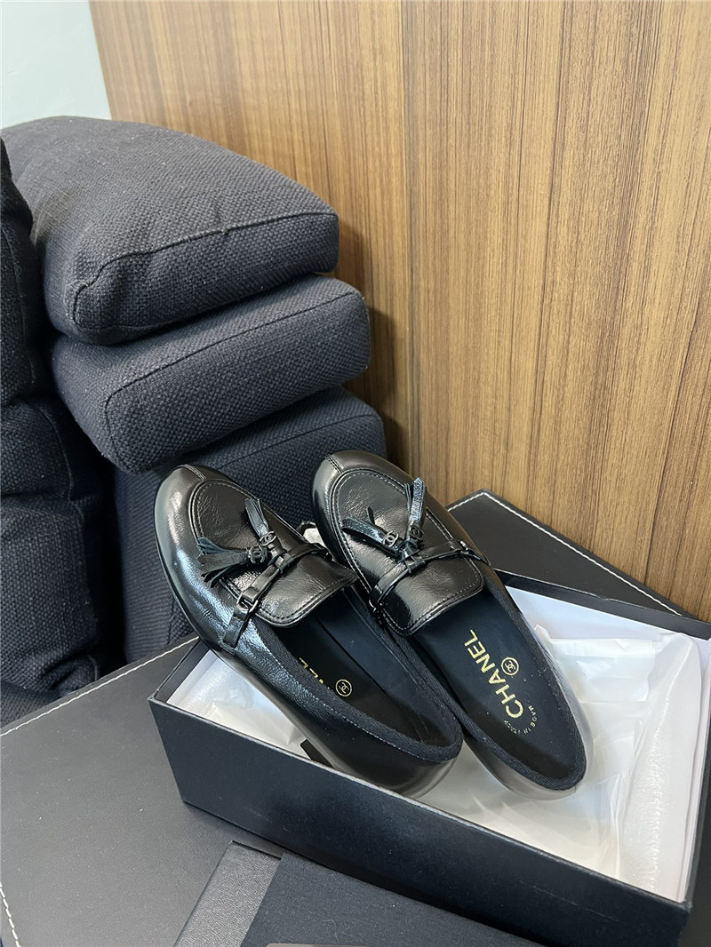 Ch**el tassel moccasin loafers in black smooth leather