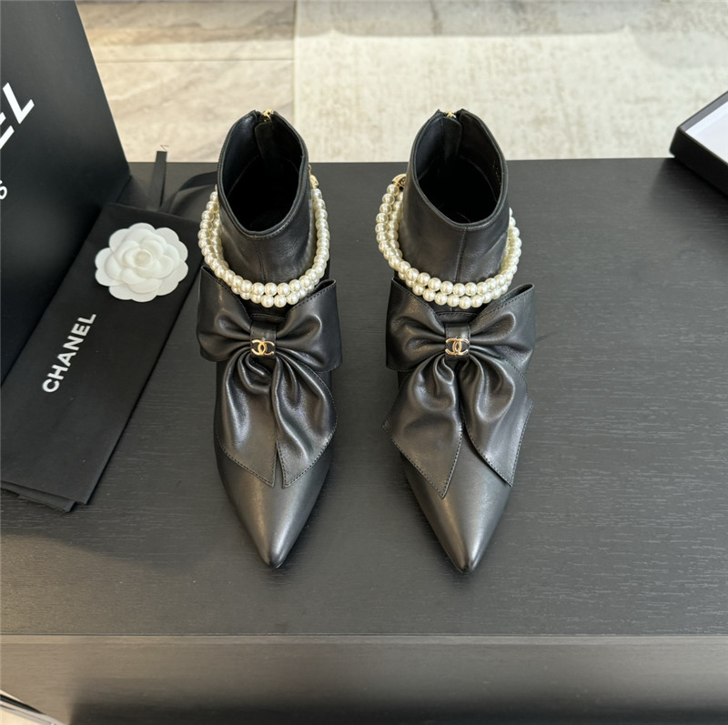 Ch**el black pointed toe pearl bow ankle boots