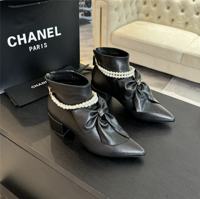 Ch**el black pointed toe pearl bow ankle boots