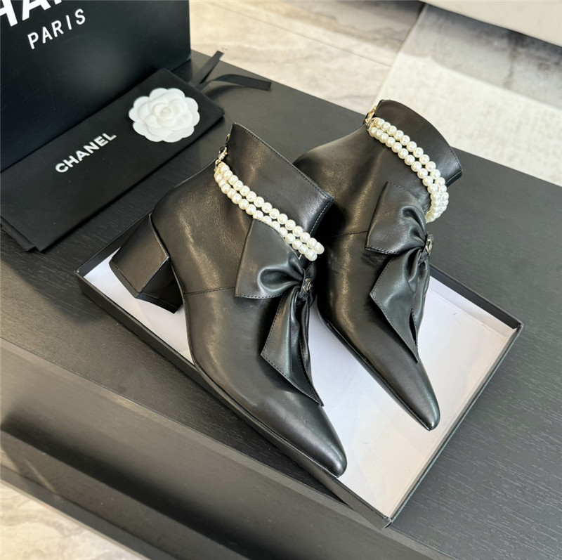 Ch**el black pointed toe pearl bow ankle boots