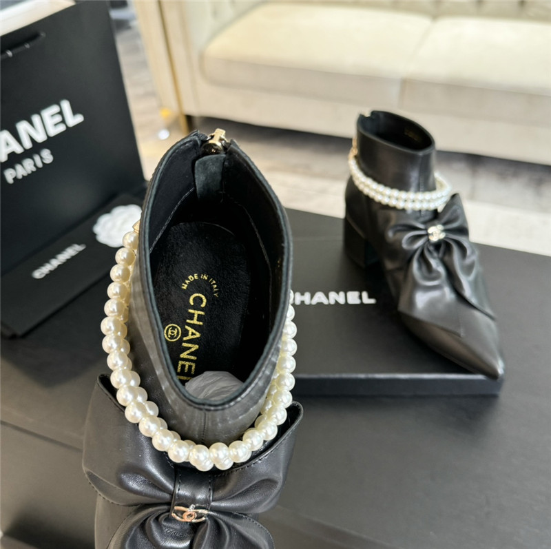 Ch**el black pointed toe pearl bow ankle boots