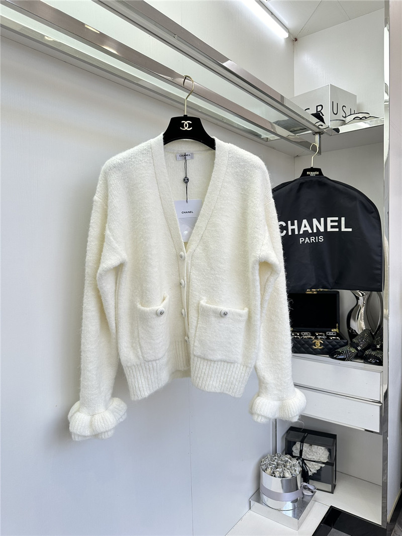 Ch**el white v-neck cardigan with floral cuffs